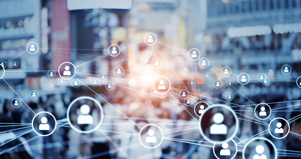 Medical professionals in discussion with city skyline background