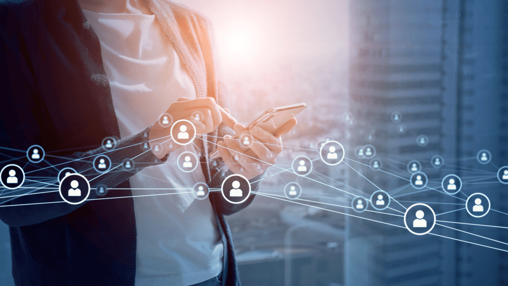 Medical professionals in discussion with city skyline background